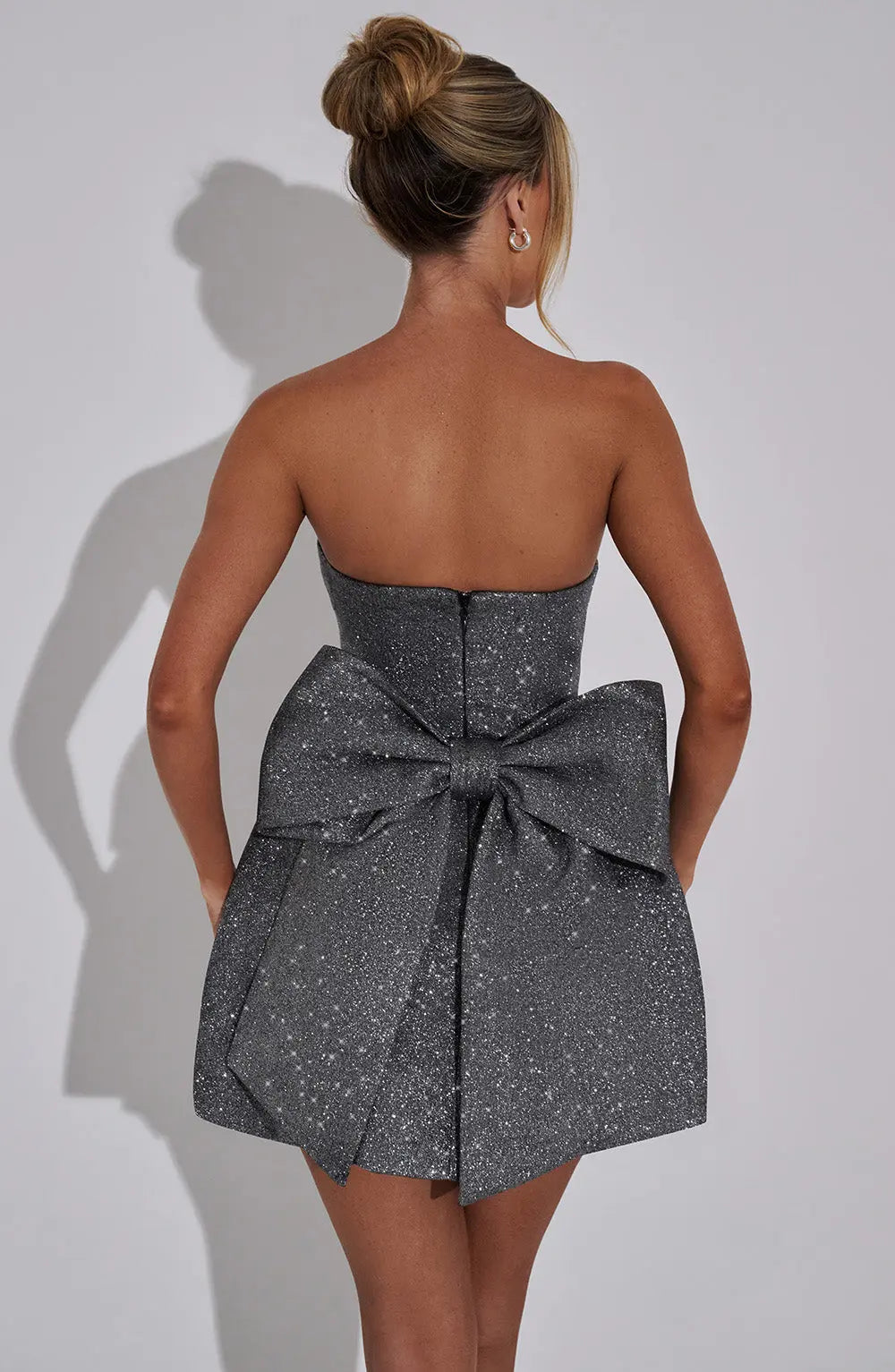 Strapless Glitter Mini Dress with Oversized Bow Back