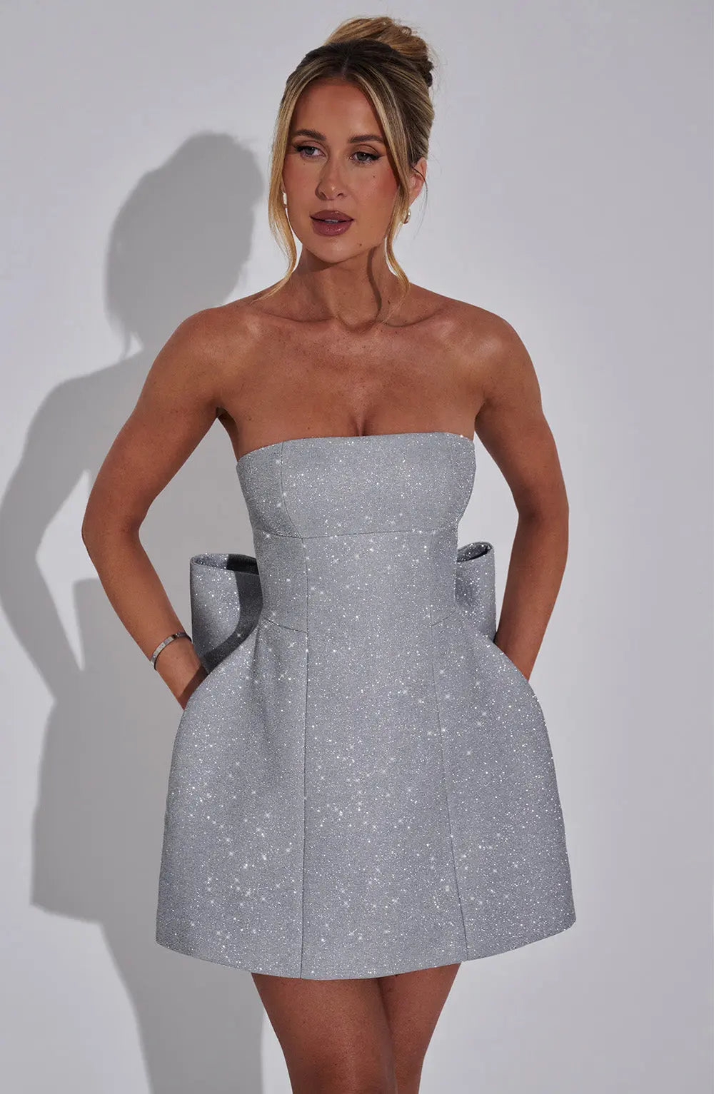 Strapless Glitter Mini Dress with Oversized Bow Back